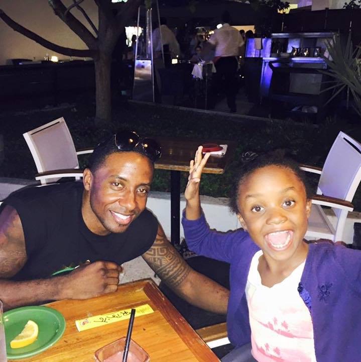 Terry and Anabelle Hammons smiling together at an outdoor restaurant table